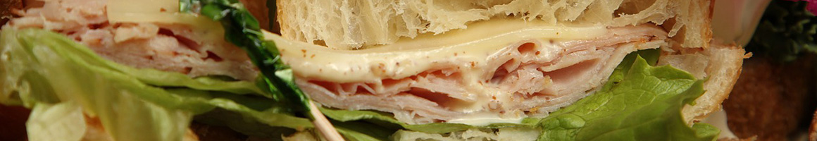 Eating Sandwich at Passero's Coffee Roasters restaurant in Philadelphia, PA.
